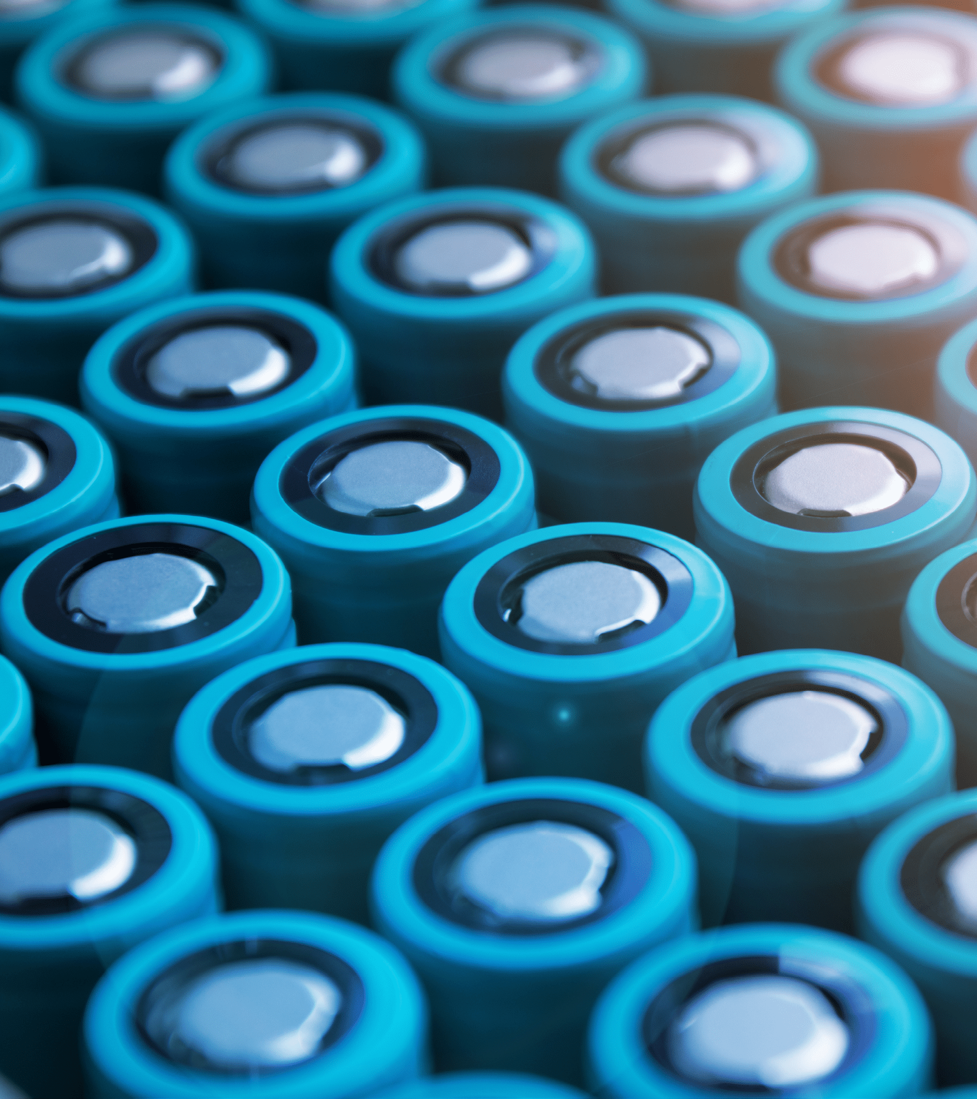 A pack of lithium-ion cells of the 18650 format folded with a positive terminal up  Image with flare effect 